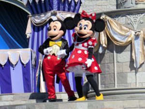 Mickey and Minnie at Cinderella Castle on Magic Kingdom in the day on February 11, 2015 in Orlando - Florida