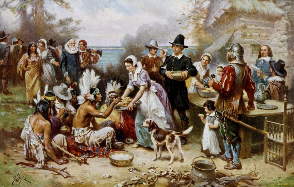 Tableau montrant des pèlerins servant un repas en plein air à des Wampanoag assis au premier plan