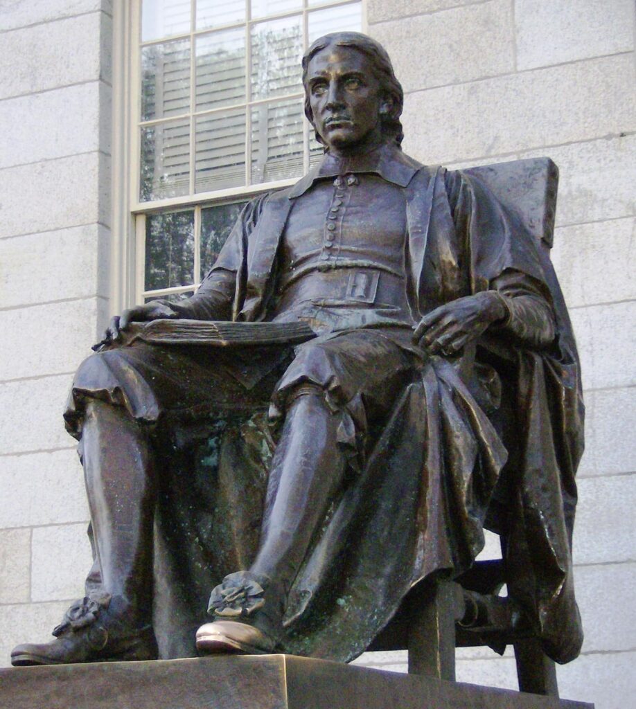 La statue de John Harvard sur le campus de l'université de Harvard